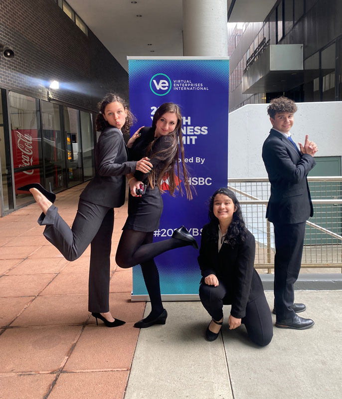 The Artemis corporate executive team enjoys a lighter moment at the business summit.