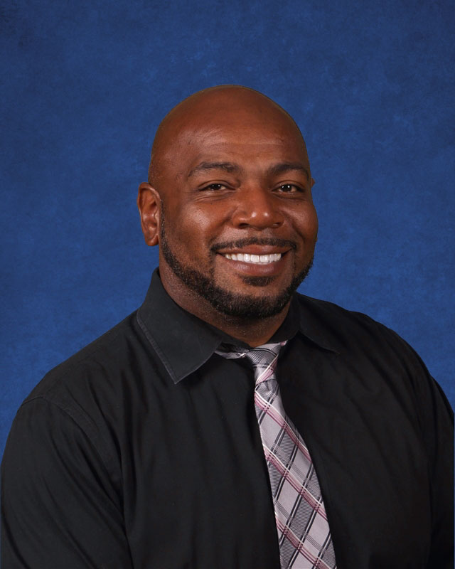 Huntington boys' track and field head coach Ronald Wilson.