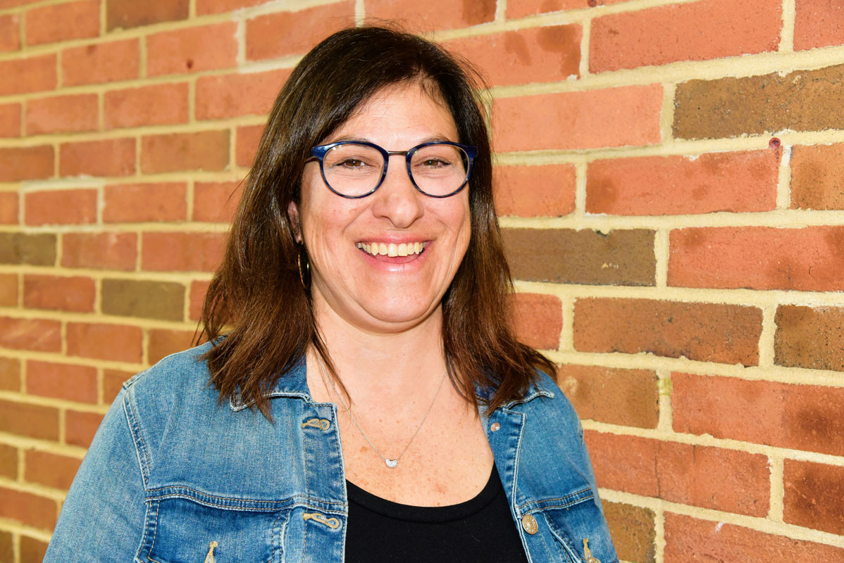 Trustee Michele Kustera is running unopposed for re-election on Tuesday, May 17.