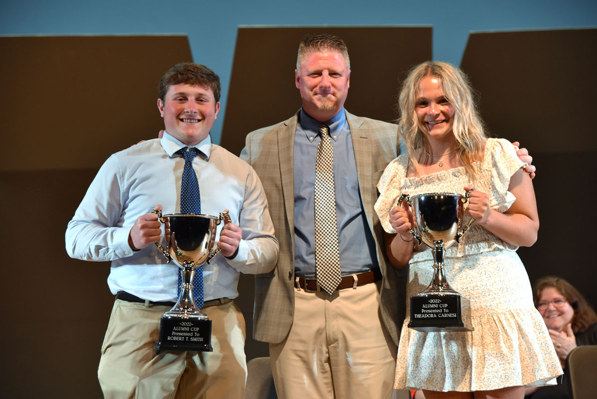 Principal Brenden Cusack with alumni cup recipients Robbie Smith and Teddi Carnesi 
