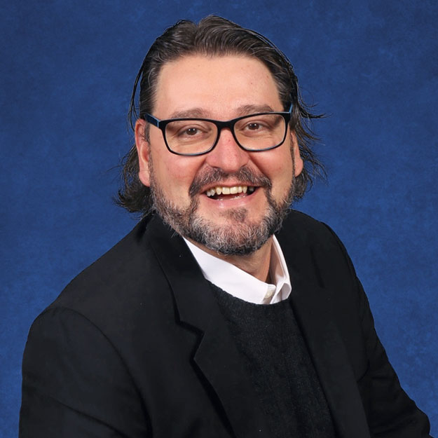 English teacher Michael Schwendemann is the drama club's faculty advisor.
