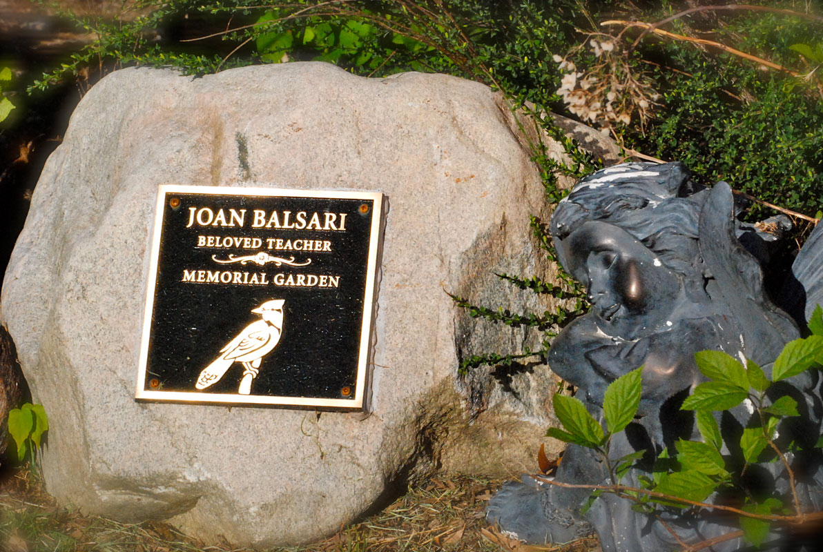 A memorial rock at the Joan Balsari garden 
