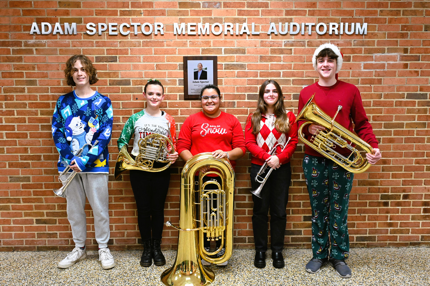  Huntington High School brass ensemble members outside the Huntington School Board meeeting   