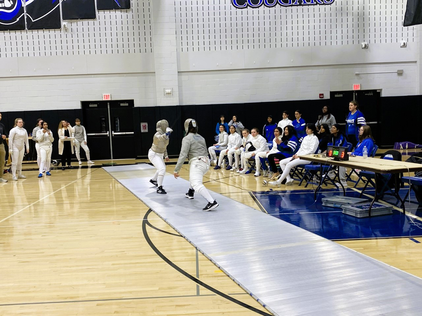  The Huntington fencing team in against this season.  
