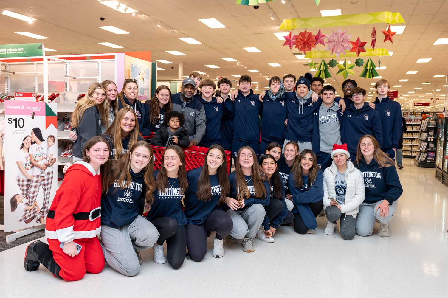  The Blue Devil varsity basketball teams shopped for 58 families. (Darin Reed photo.)  