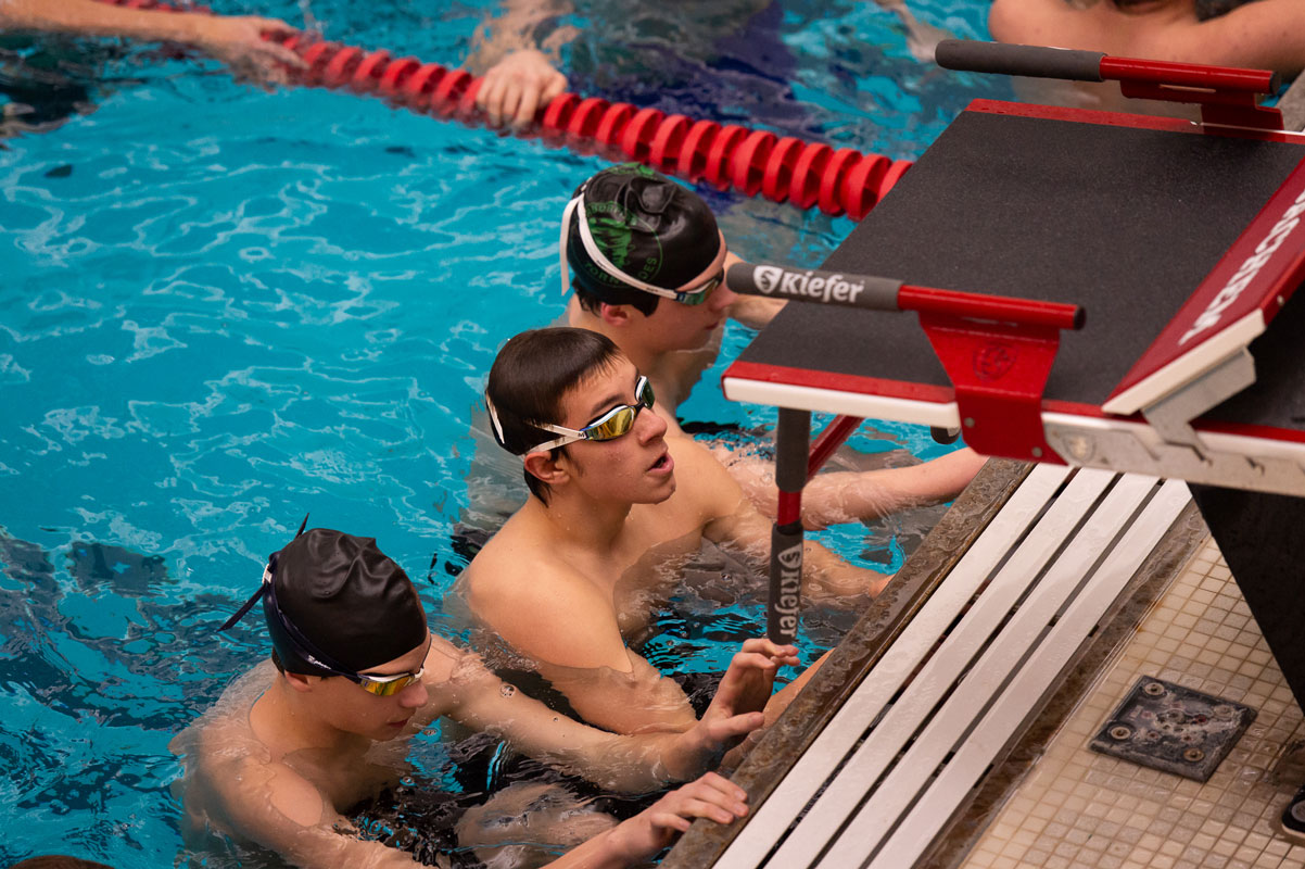 Huntington swimmers celebrated winning the league title by a wide margin. (Darin Reed photo.)