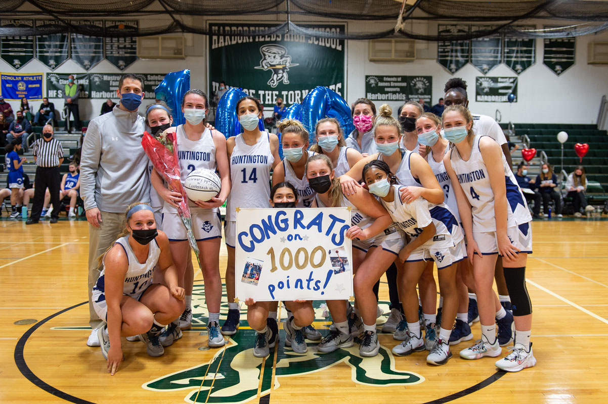 Emily Plachta scored the 1,000th point of her career during the game. (Darin Reed photo.)