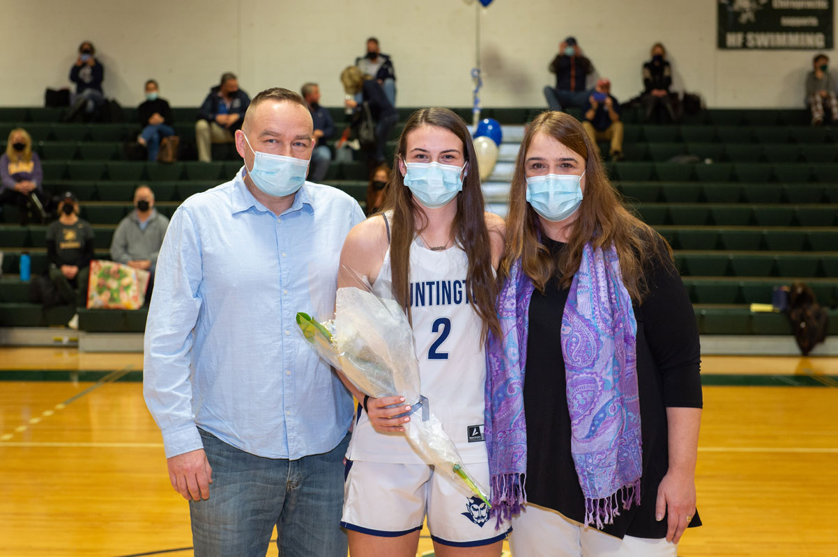 Emily Plachta and her family on Senior Day. (Darin Reed photo.)