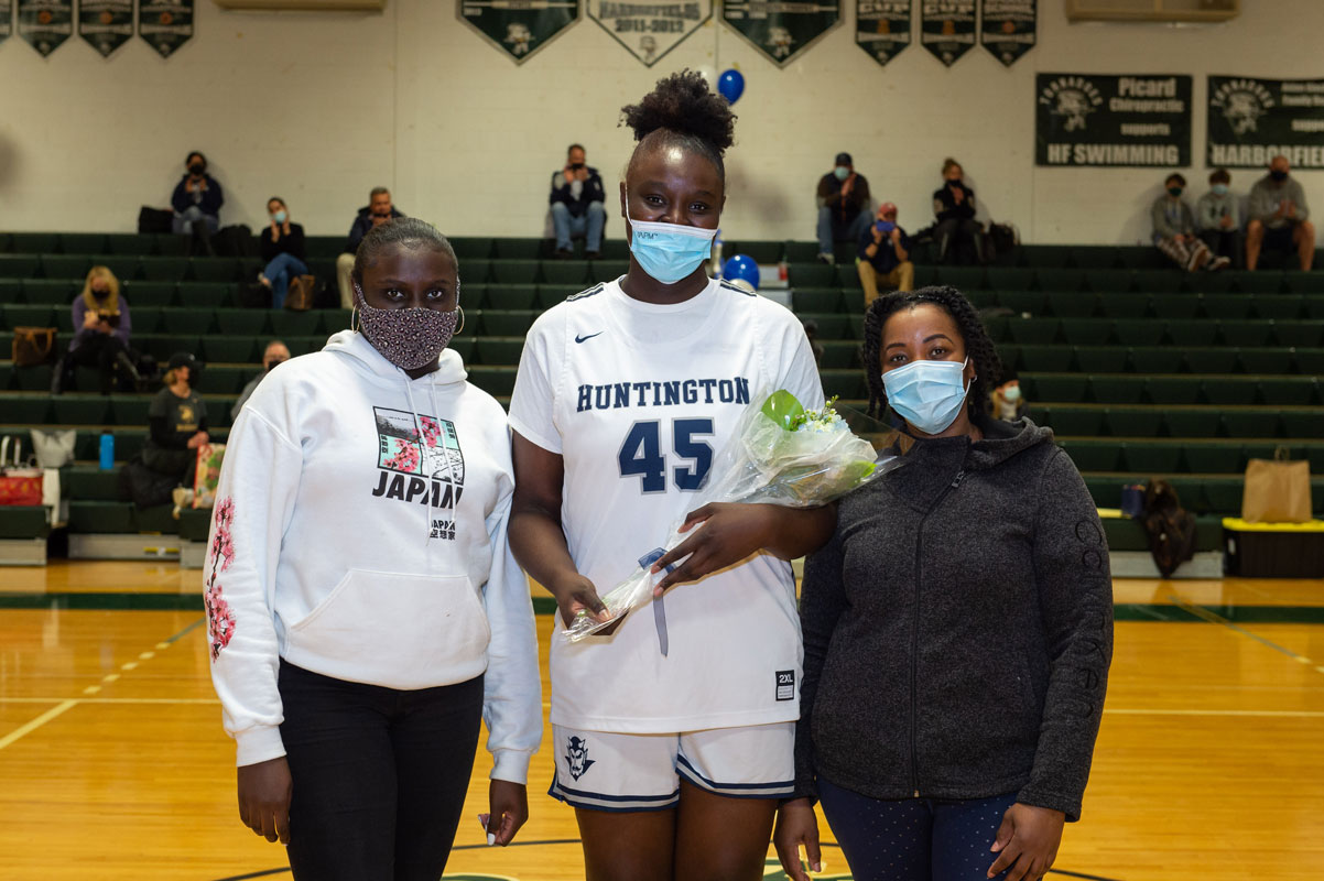 Junie Nosile and her family on Senior Day. (Darin Reed photo.)
