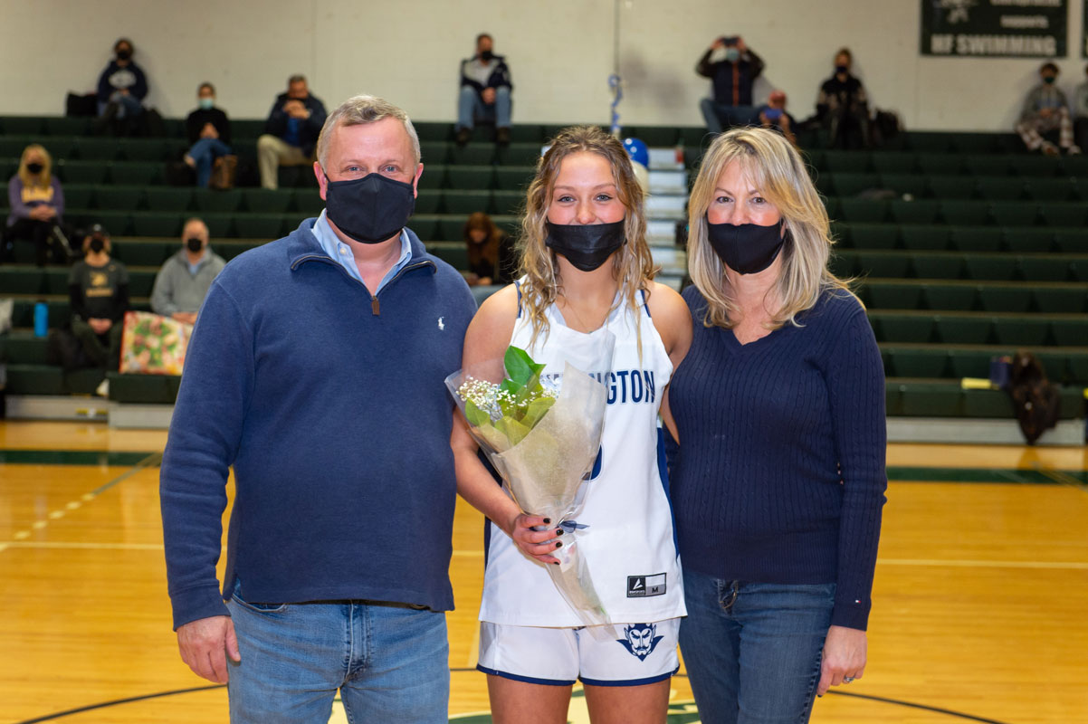 Katie Browne and her family on Senior Day. (Darin Reed photo.)