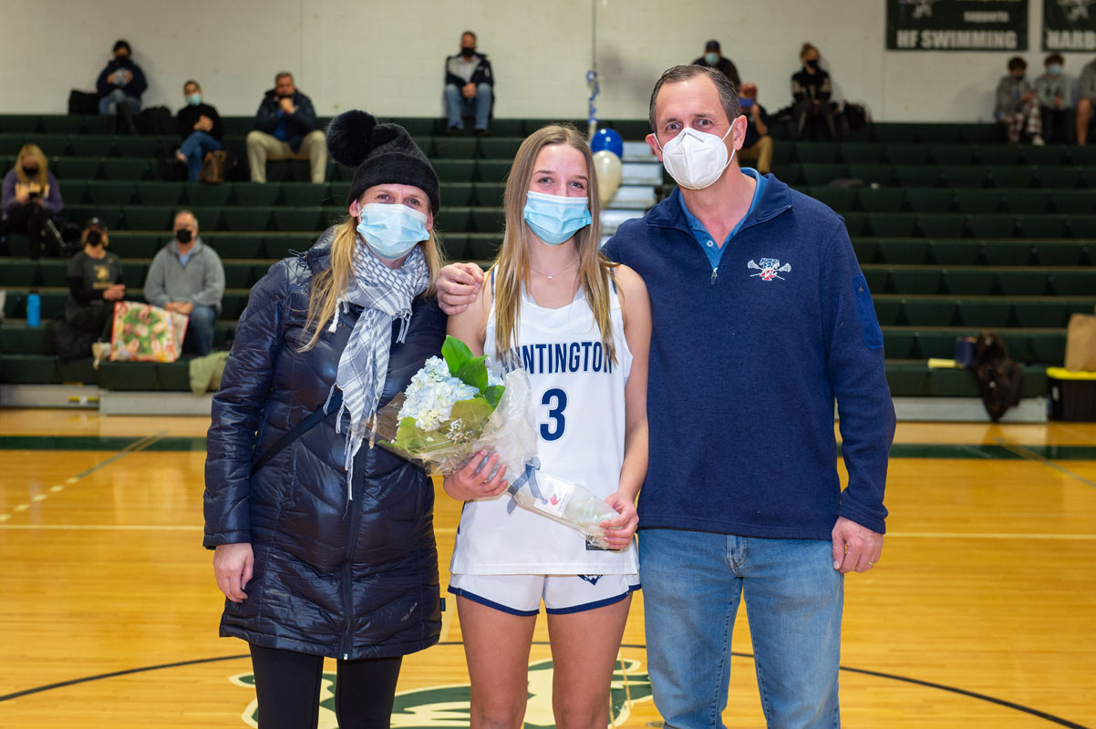 Regan Sansiviero with her family on Senior Day. (Darin Reed photo.)