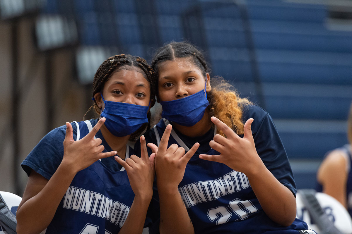 Shaneek Shand and Asyria Rios love their Blue Devil fans. (Darin Reed photo.)