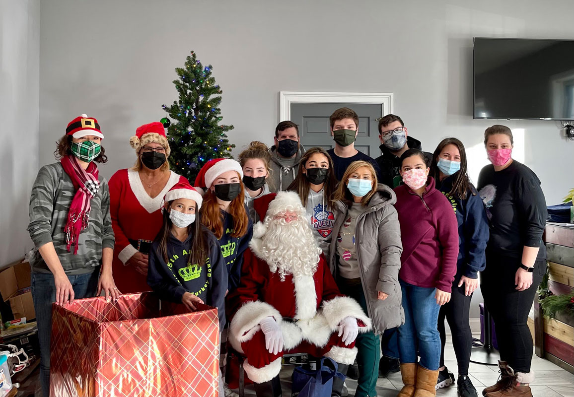 Finley Community Club members helped with distribution of gifts to local families 