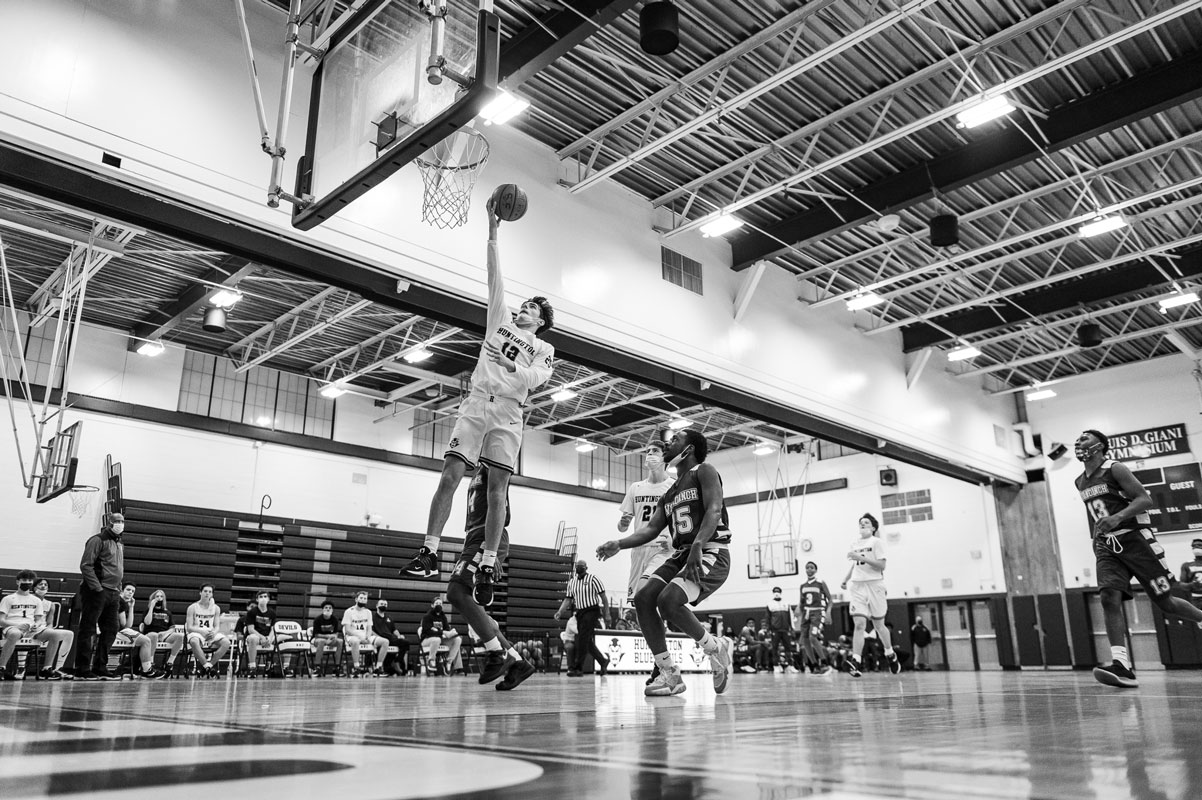 Max Rentsch goes to the basket against Wyandanch last week. (Darin Reed photo.)