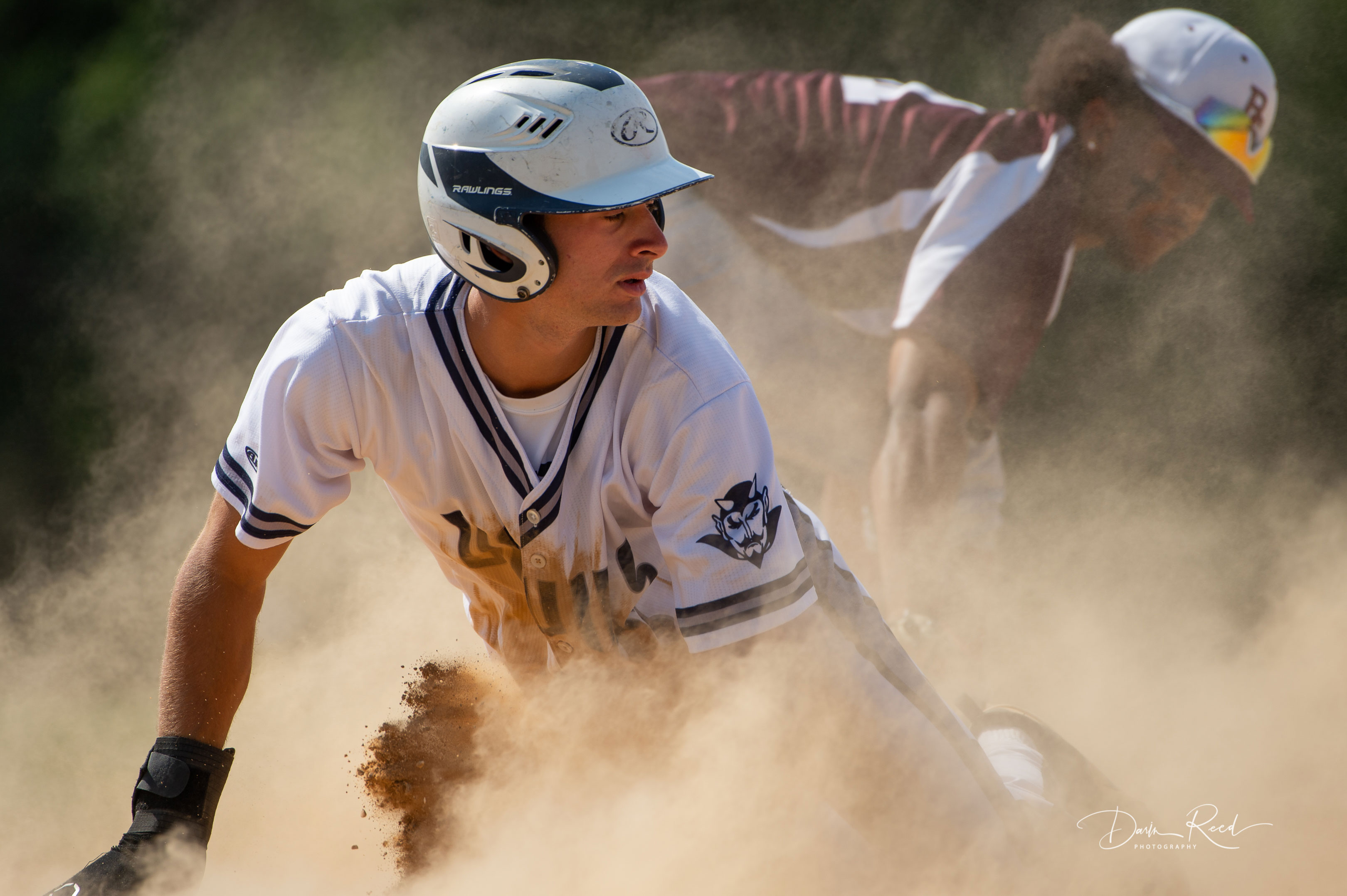 Chris Segreti slides into third base. (Darin Reed photo.)