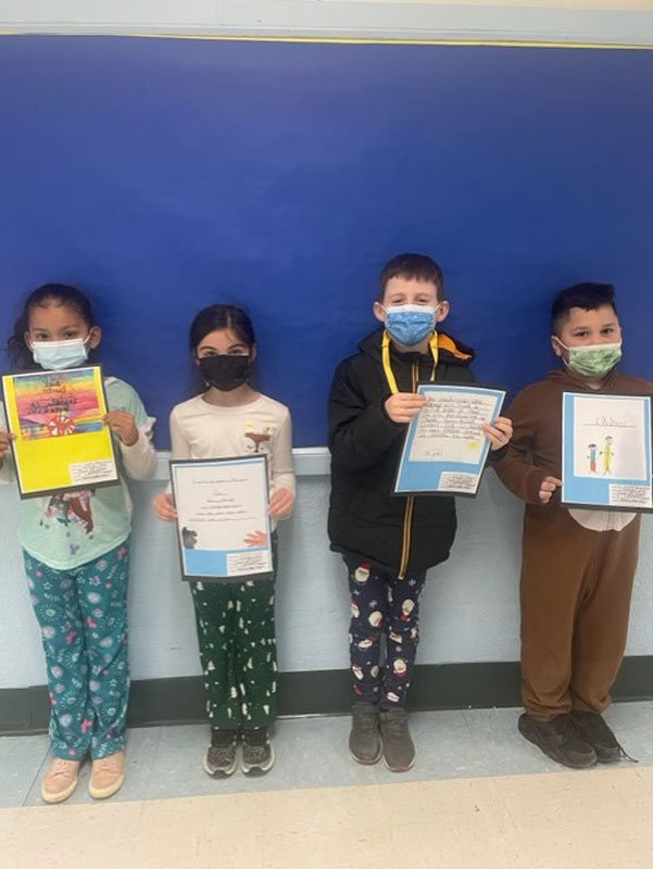 Flower Hill second graders show off their work in honor of Dr. Martin Luther King, Jr 