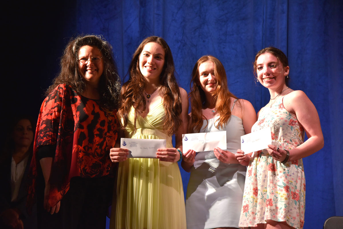 Teacher Gina Trigian-Molvaut with Cassidy Casabona, Mary Grace Rorke and Sophie Laserson (1