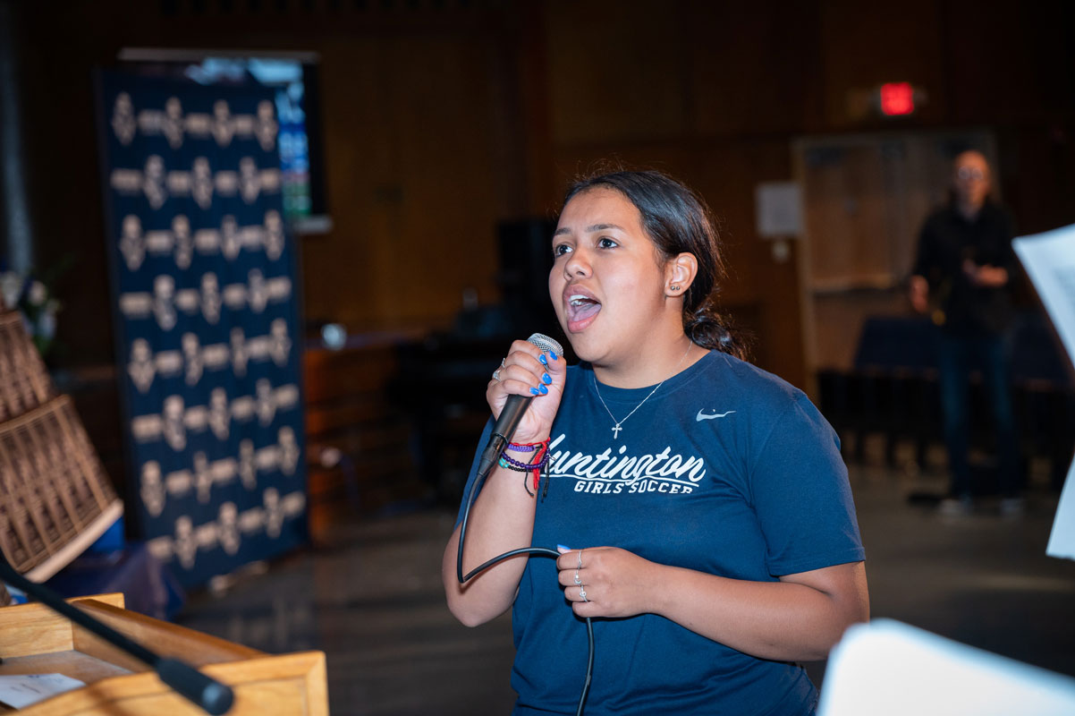 Ashley Genao ran of a local soccer field to perform at the senior athletic awards ceremony. (Darin Reed photo.)