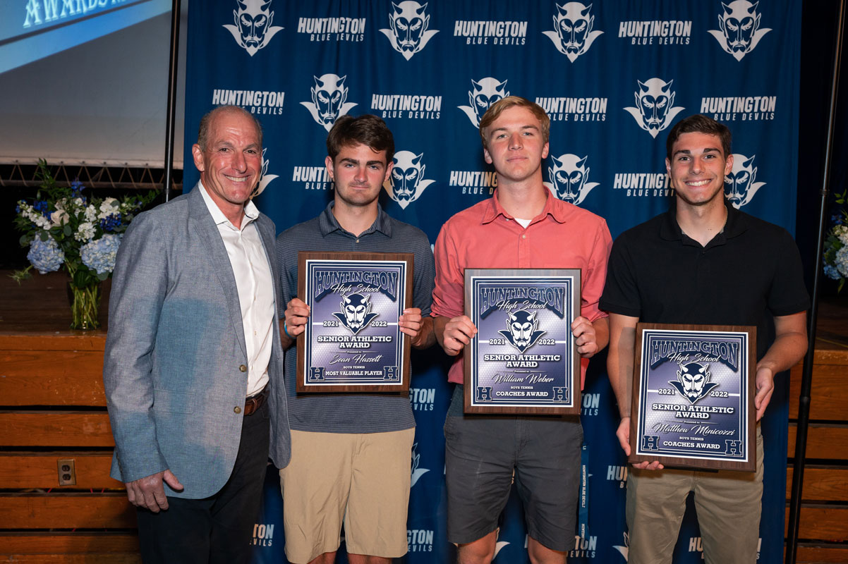 Coach Jamie Fishlow with Sean Hassett, Will Weber and Matt Minicozzi .(Darin Reed photo.)