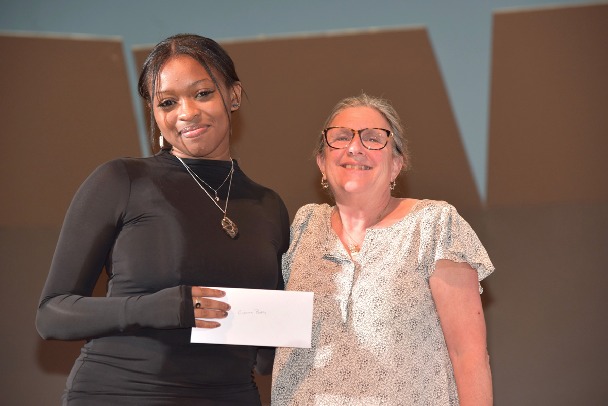 Cianna Batts with Tri-CYA's Debbie Rimler at senior awards night.