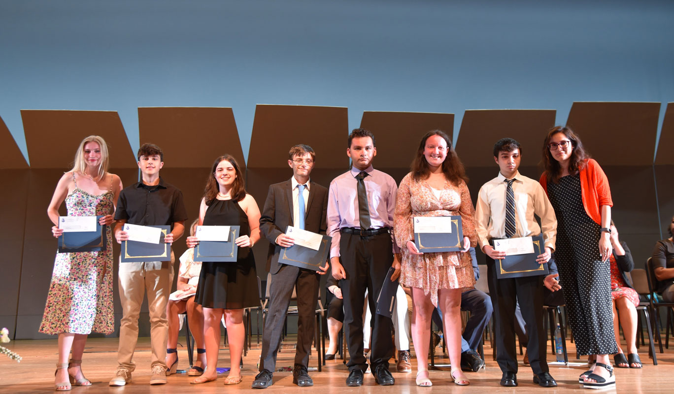 Guidance counselor Diana Bonilla with SEPTA scholarship recipients.  