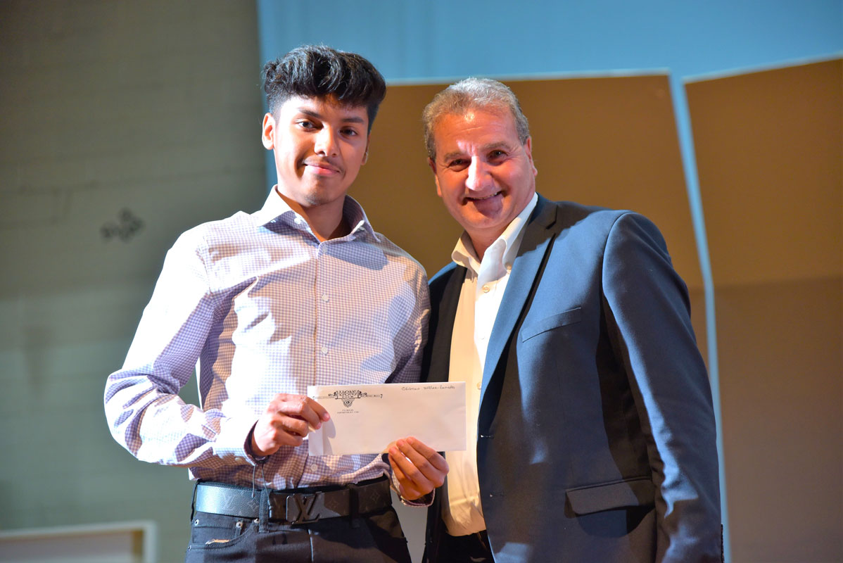 Lions Club President John DeLorenzo Cristian Avelar-Romero.