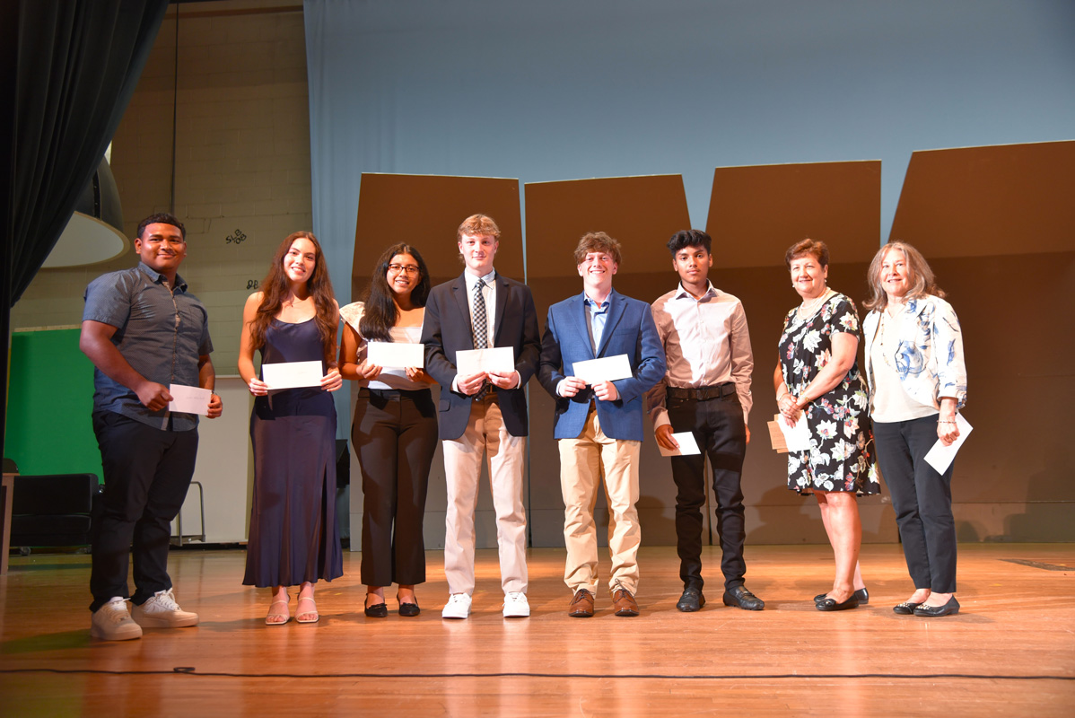 Class of 1971 members Laraine Schrippa and Claudia Mingin with Class of 2022 scholarship recipients 