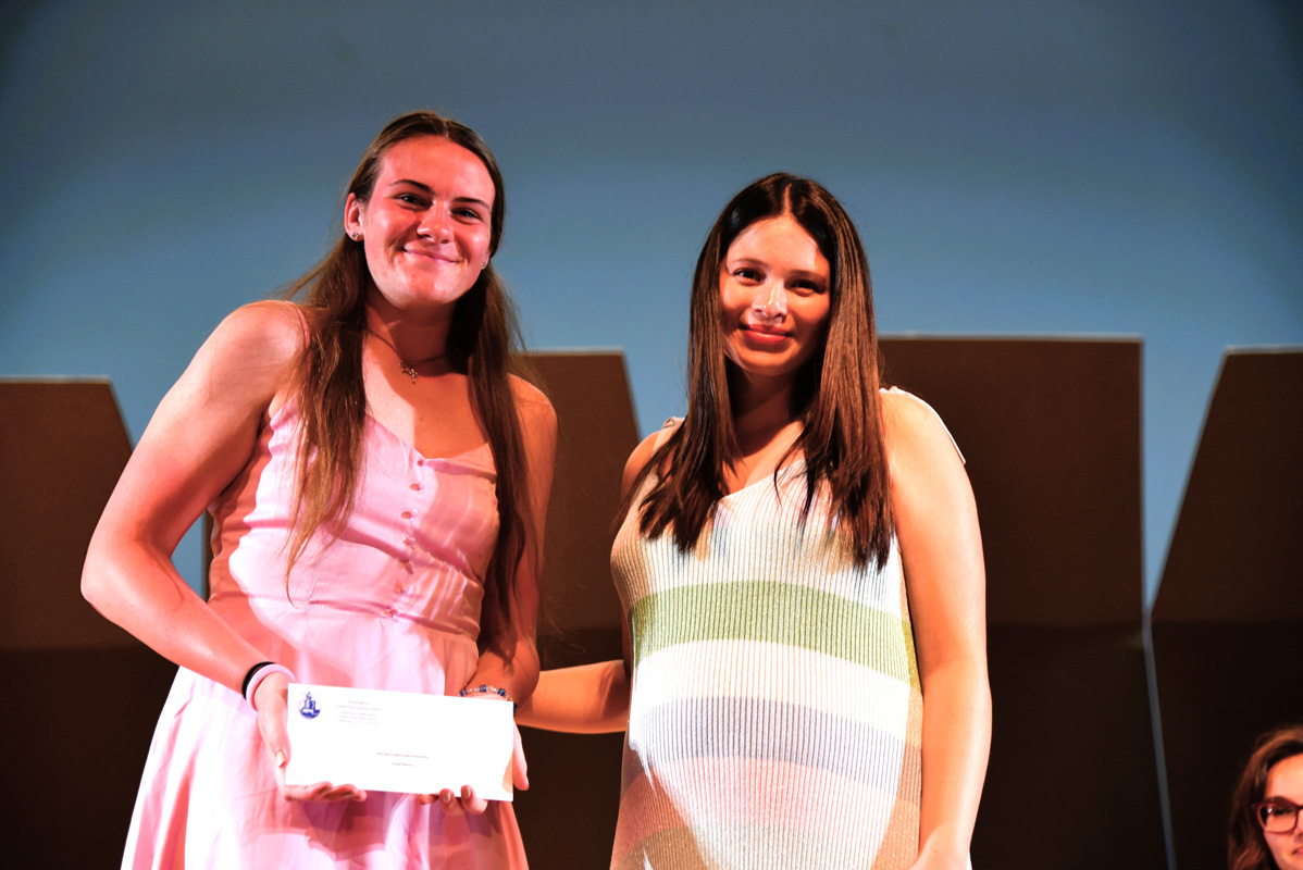 John Bosco Memorial Scholarship recipient Emily Plachta with Ivy Alvayero (2)