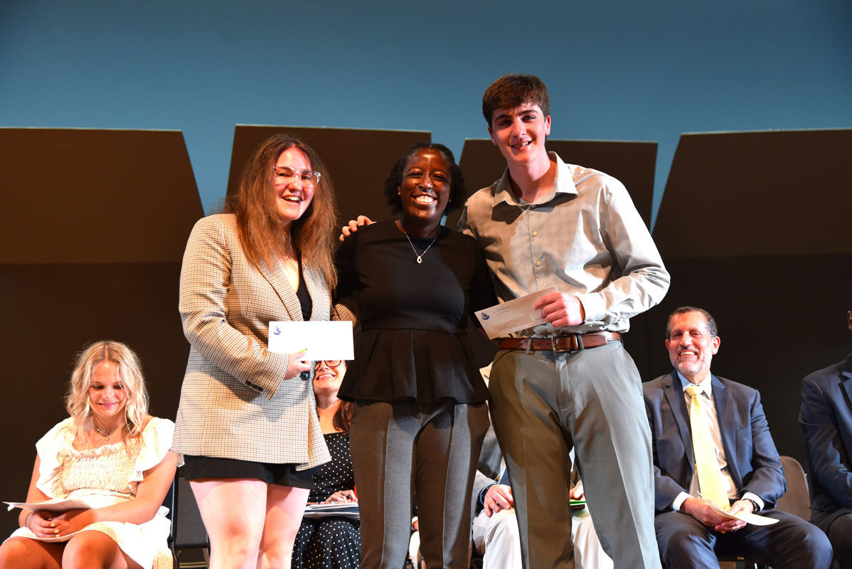 Guidance counselor Daphne Marcelin with JM West Scholarship recipients Ally Kustera and Teddy Tiliakos