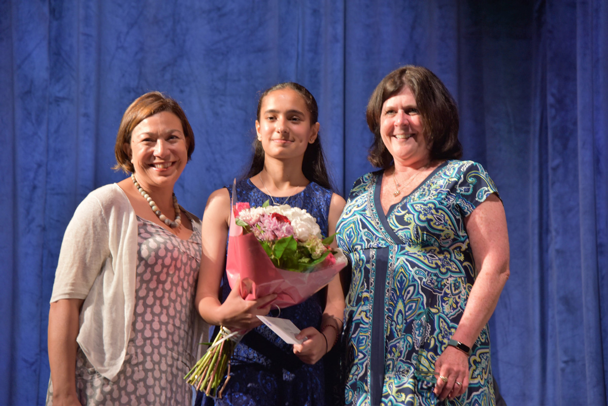 Band Parent Assn. Presidents Arienne Lima and Erin Hannigan with Jasjeet Kaur.