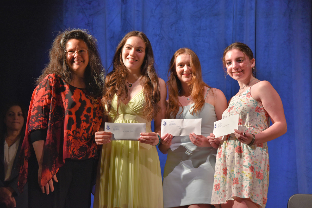 Teacher Gina Molvaut with French Award recipients 