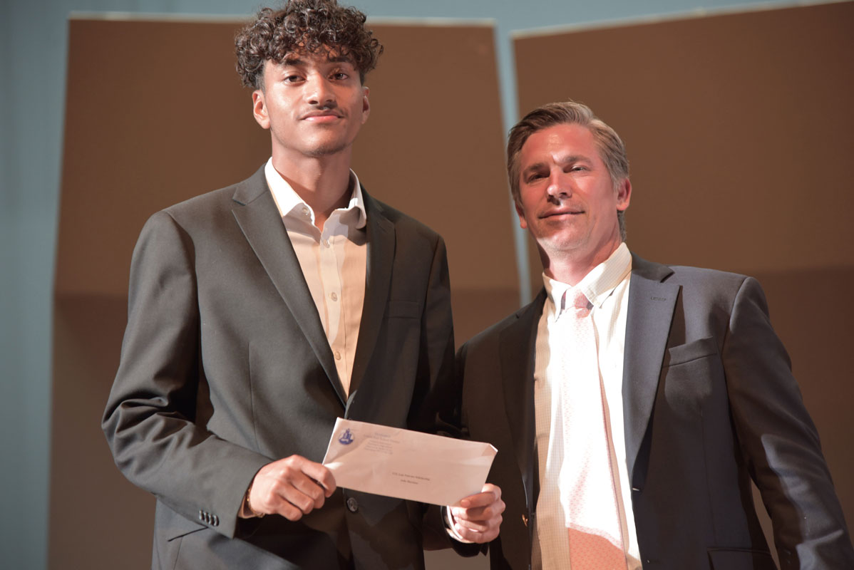 Michael Marinello presented Julio Martinez with the Nassau Police Officer Luis Palermo Memorial Scholarship 