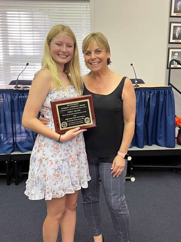 Emily Geller (with teacher Suzi Biagi) won the Suffolk Bar Assn.'s Outstanding Student Attorney Award.
