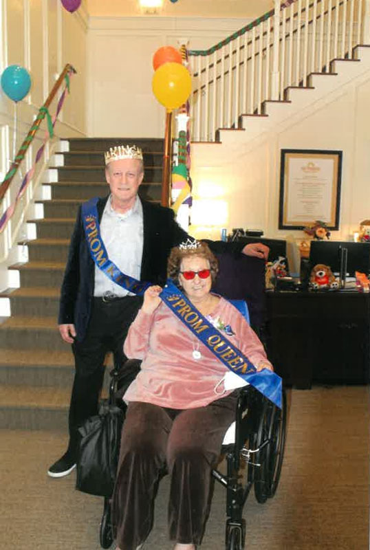 The prom king and queen are a happy couple 