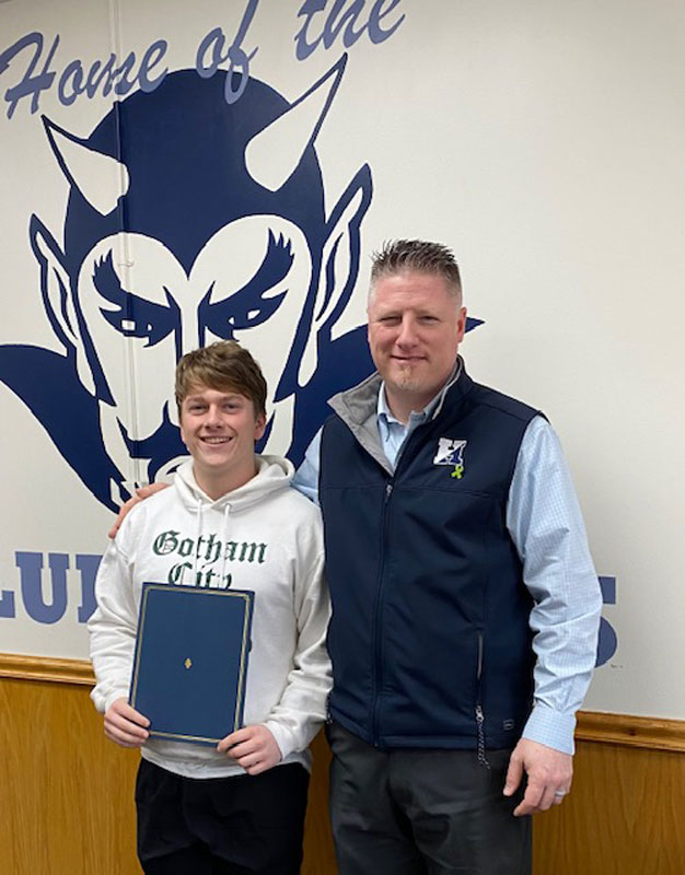Senior Ryan Porzio with Huntington Principal Brenden Cusack.