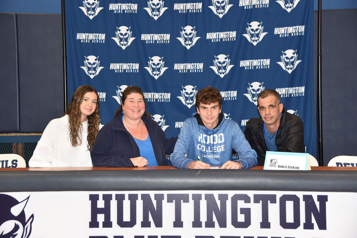 Robert Eriksen's family looks on as he inks a commitment to Hood College lacrosse (4)