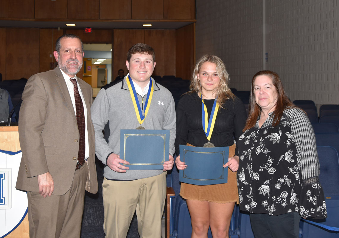 Robert Smith and Teddi Carnesi with Supt. Jim Polansky and BOE President Christine Biernacki.