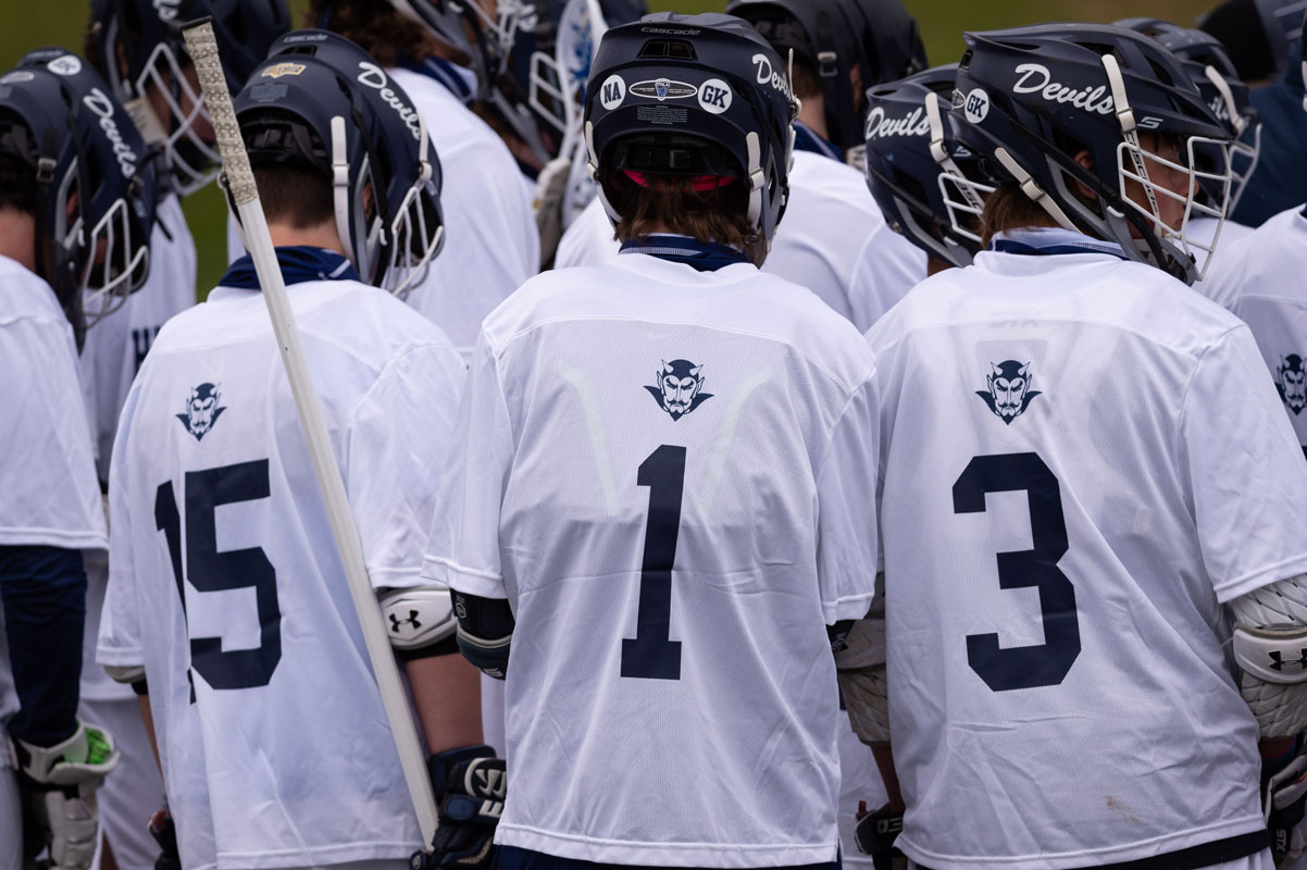 The Blue Devil boys' lacrosse team won its season opener at Sachem East. (Darin Reed photo.)
