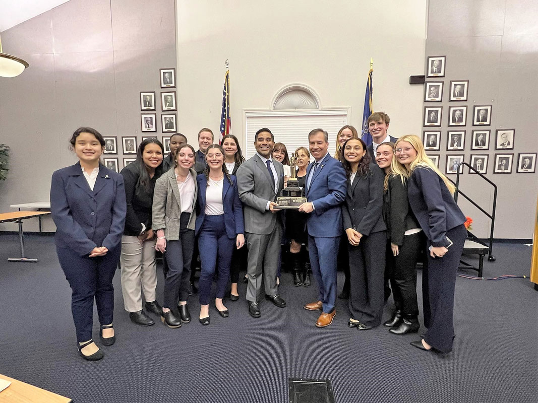 Huntington's mock trial team celebrates winning the Suffolk championship 