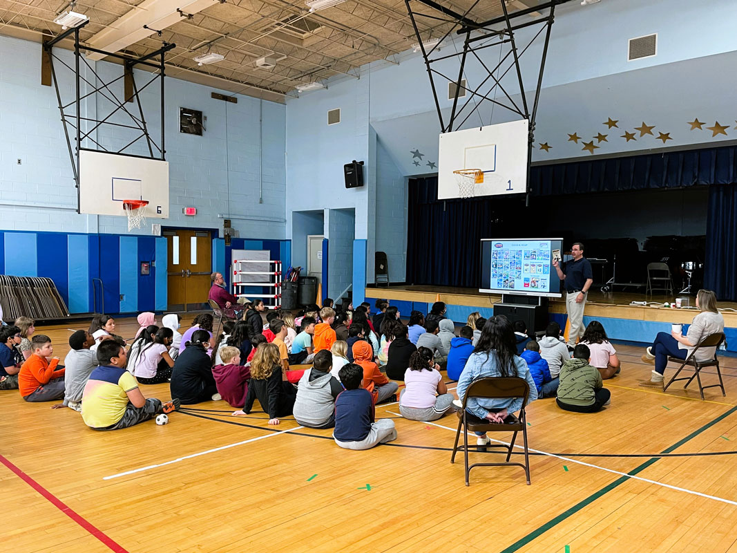 Author David Kelly with Woodhull Intermediate School fourth graders.