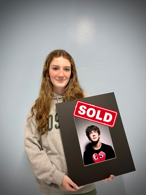 Huntington senior Finley Dunn with her artwork.