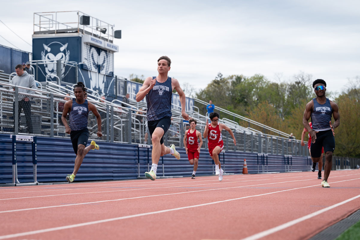 Nick Grover (center) is in the midst of a great track season. (Darin Reed photo.)