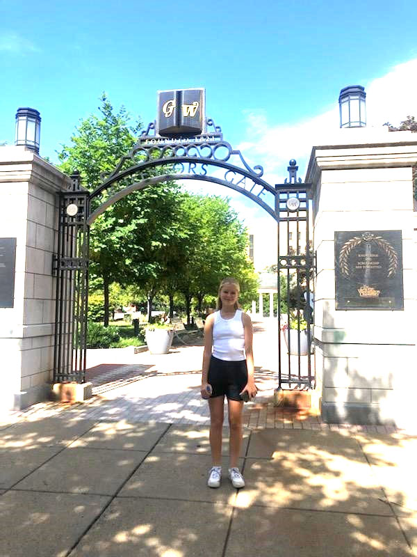 Emily Geller at the George Washington University gates.