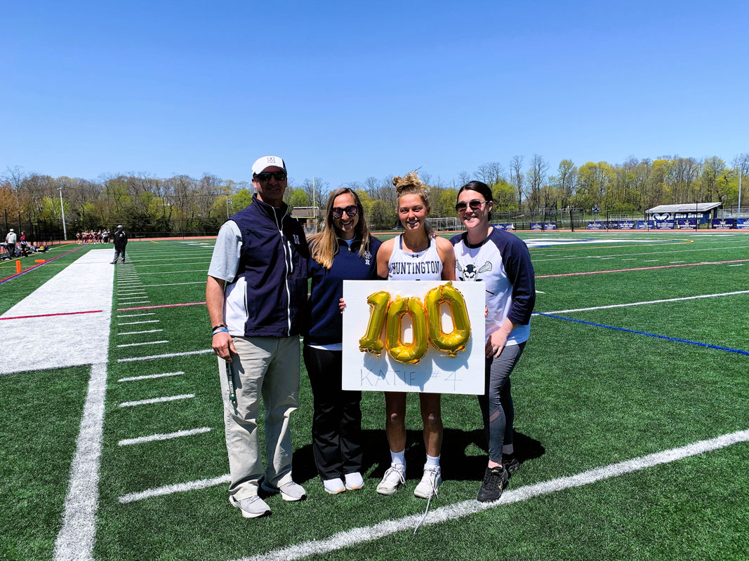 Katie Browne with coaches Chris Taylor, Katie Reilly and Shea Scully.