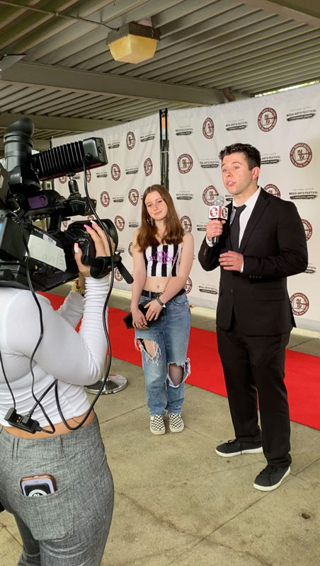 Katerina Damiano gets interviewed following the award ceremony 