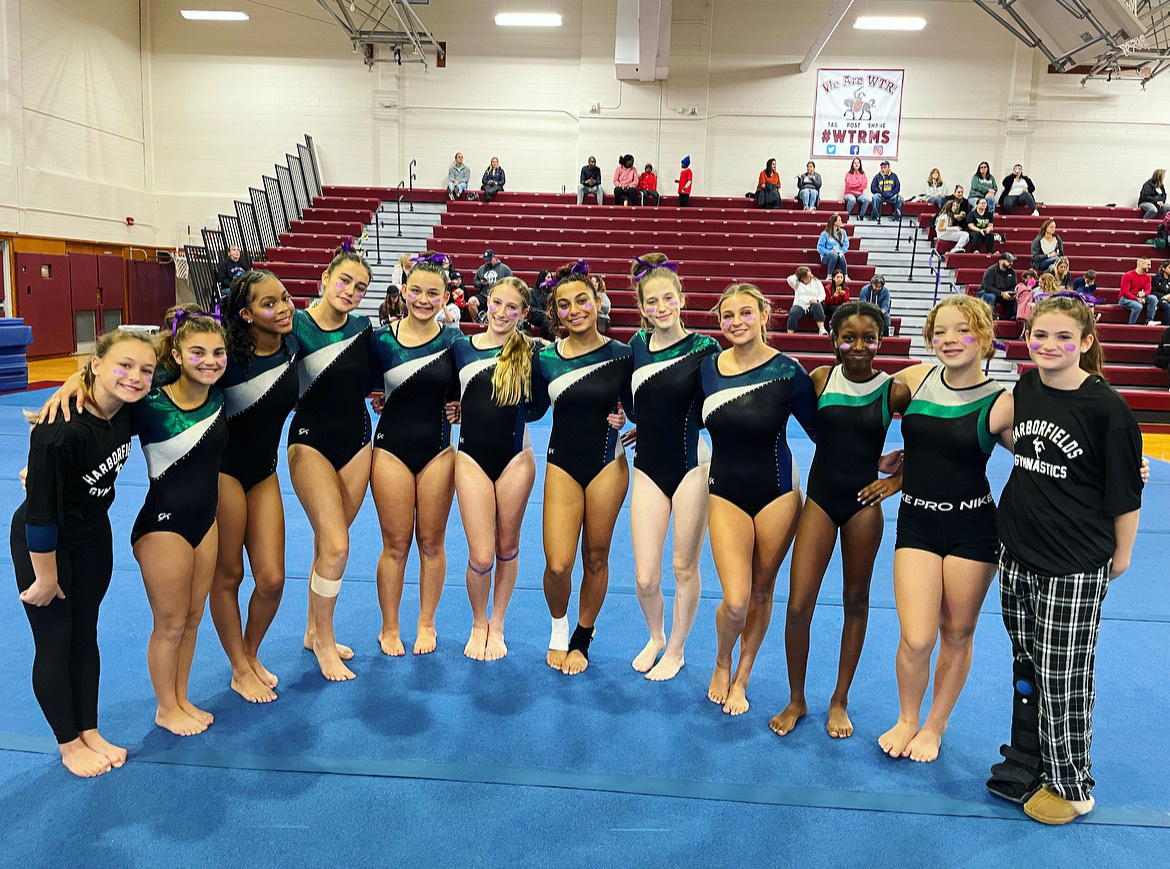 The combined Harborfields-Huntington girls' gymnastics team.