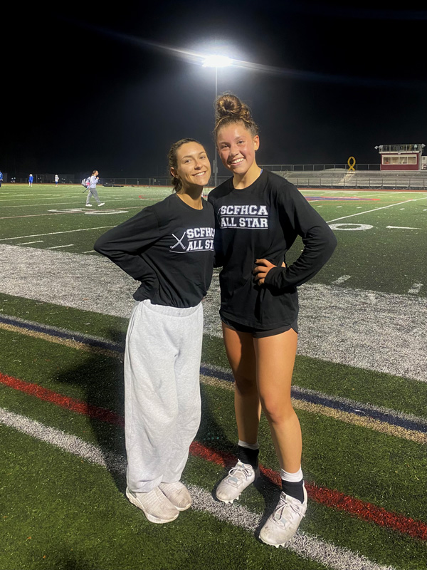 Huntington field hockey stars Carlee Schultz and Laurel Bonn at the Suffolk All-Star game.