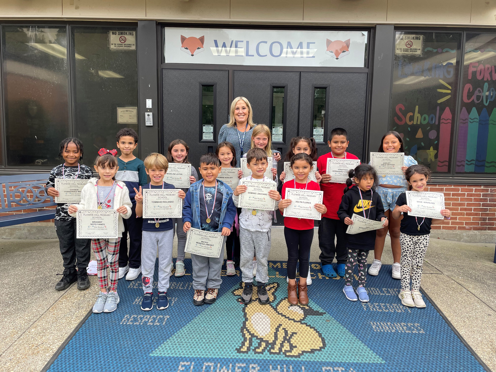 Principal Cindy Siegel with Flower Hill's Star Student Award recipients. 