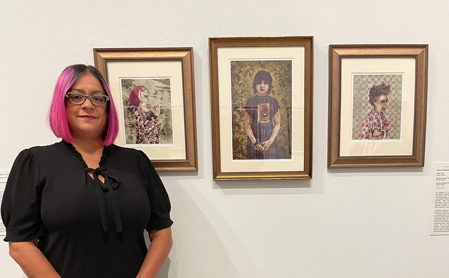  Huntington art teacher Kasmira Mohanty with her artwork at the Heckscher Museum.   