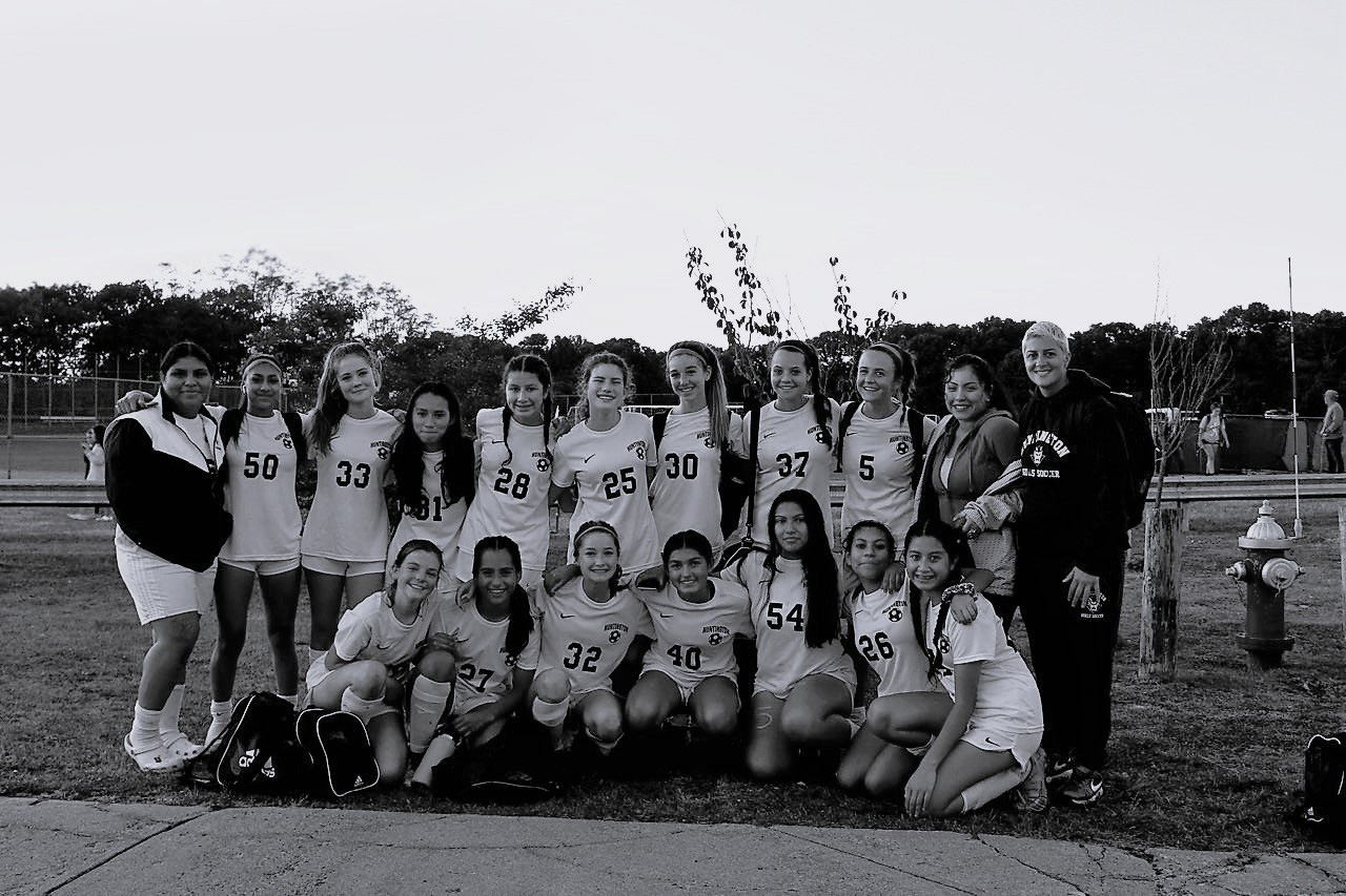  The 2022 Huntington High School JV girls' soccer team with Coach Maria Canino.  